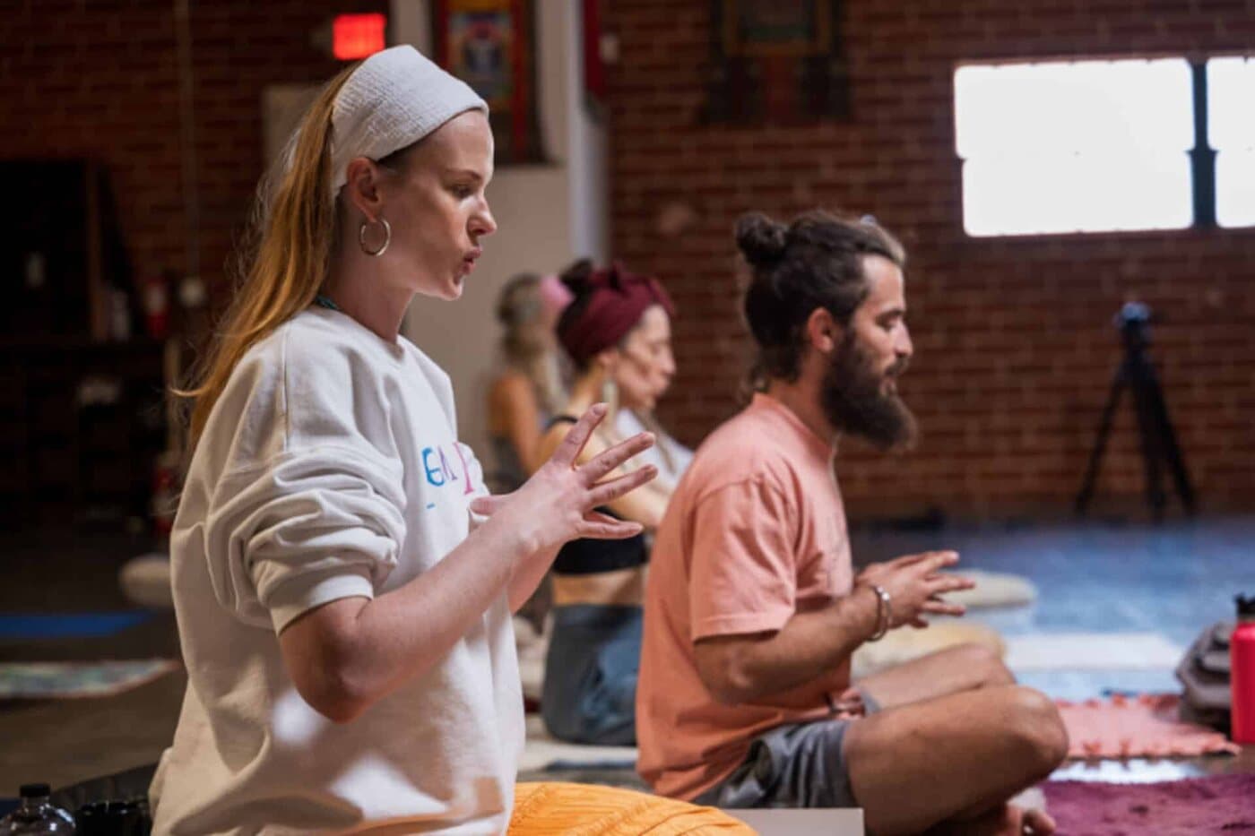 A Kundalini yoga and meditation class in session at RA MA